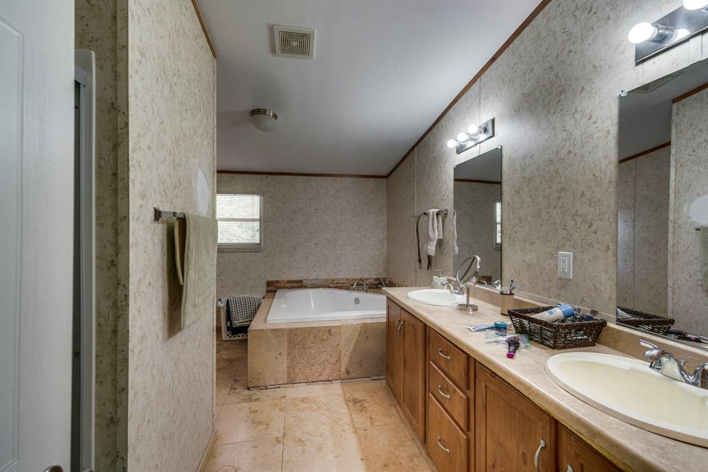 7251 Bennett Lawson Road Mansfield, TX 76063 - Photo 12 of 34 a bathroom with a sink double vanity