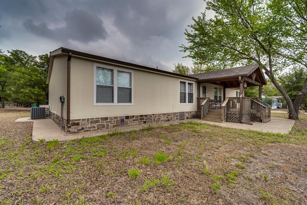 7251 Bennett Lawson Road Mansfield, TX 76063 - Photo 5 of 34 a house with trees in the background