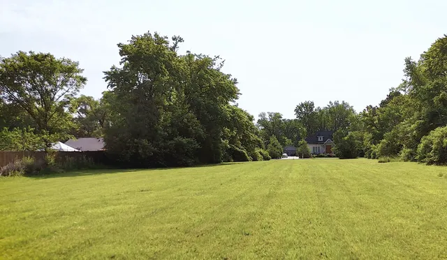 a view of an outdoor space and a yard