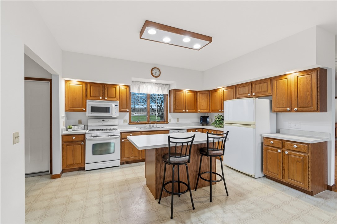 3935 Highway 414 Rose, NY 14433 - Photo 14 of 44 Enjoy the BREAKFAST BAR in the kitchen with SO MUC