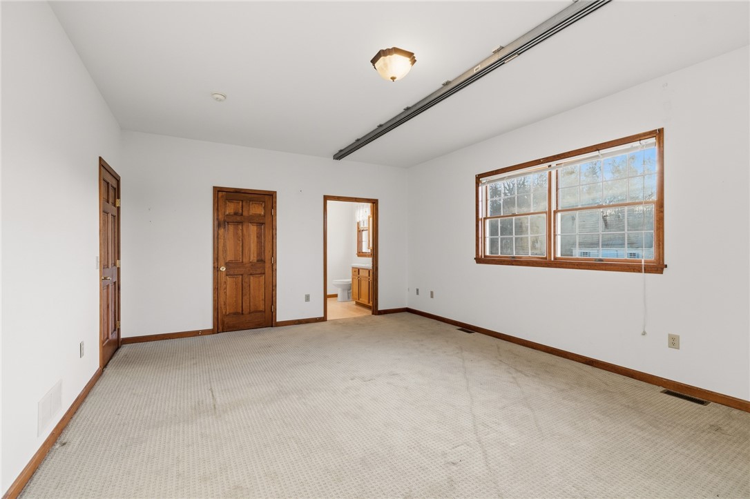 3935 Highway 414 Rose, NY 14433 - Photo 19 of 44 The PRIMARY SUITE with WALK IN CLOSET and FULL BAT