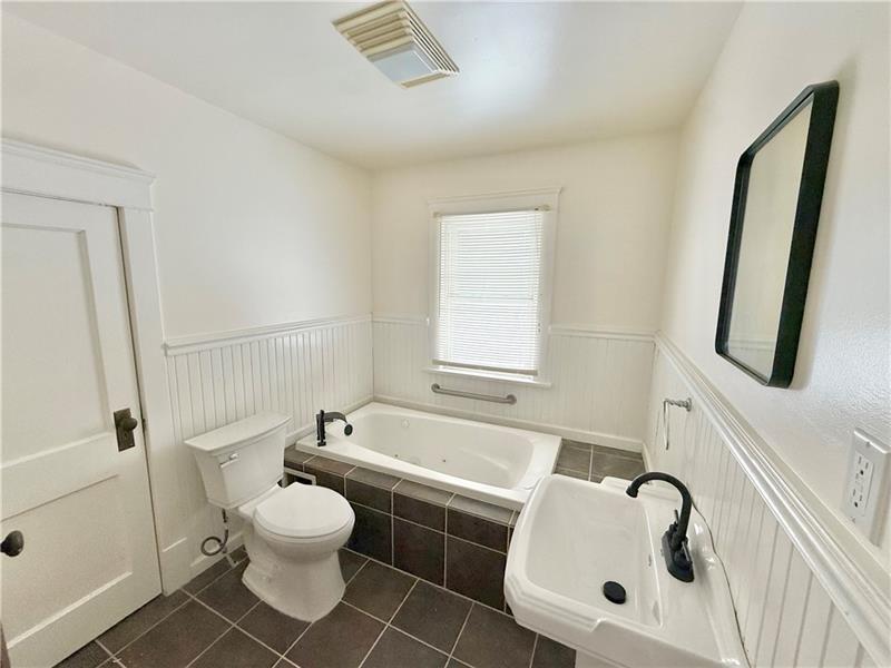 657 North Street Meadville, PA 16335 - Photo 18 of 24 a bathroom with a toilet sink and bathtub