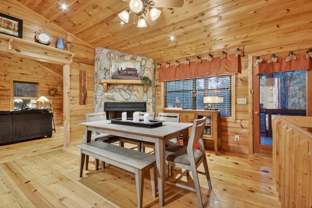 97 Doyle Carder Parkway Blue Ridge, GA 30513 - Photo 12 of 49 a table and chairs in front of a building