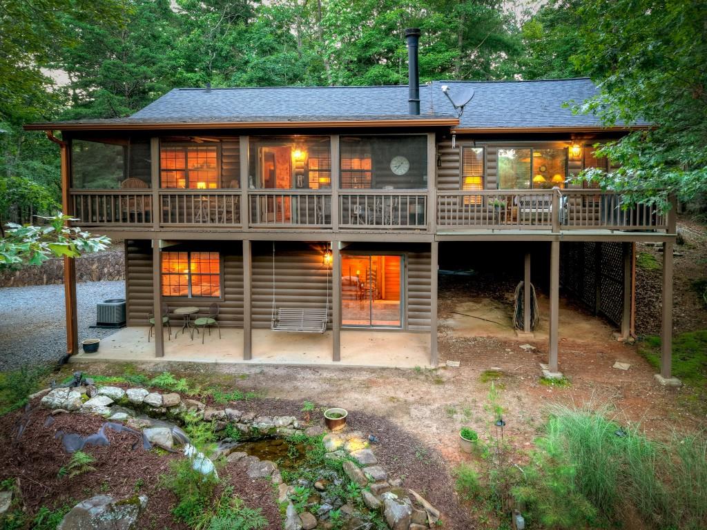 97 Doyle Carder Parkway Blue Ridge, GA 30513 - Photo 2 of 49 a front view of a house with a yard