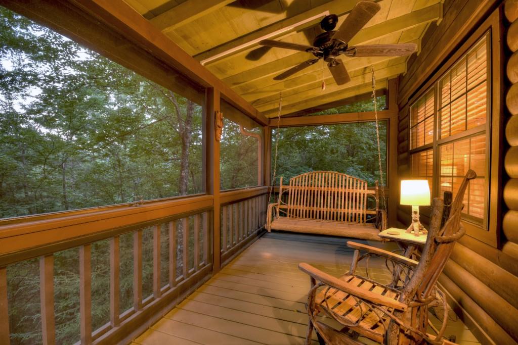 97 Doyle Carder Parkway Blue Ridge, GA 30513 - Photo 24 of 49 a porch with a table in balcony