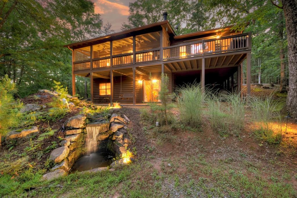 97 Doyle Carder Parkway Blue Ridge, GA 30513 - Photo 39 of 49 a view of a house with a yard