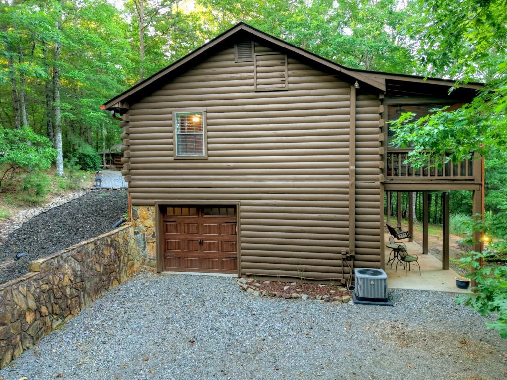 97 Doyle Carder Parkway Blue Ridge, GA 30513 - Photo 40 of 49 a front view of a house with a yard