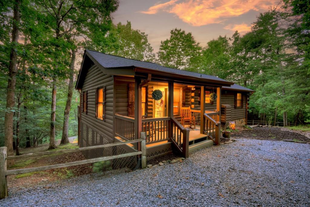 97 Doyle Carder Parkway Blue Ridge, GA 30513 - Photo 48 of 49 a view of a house with a yard