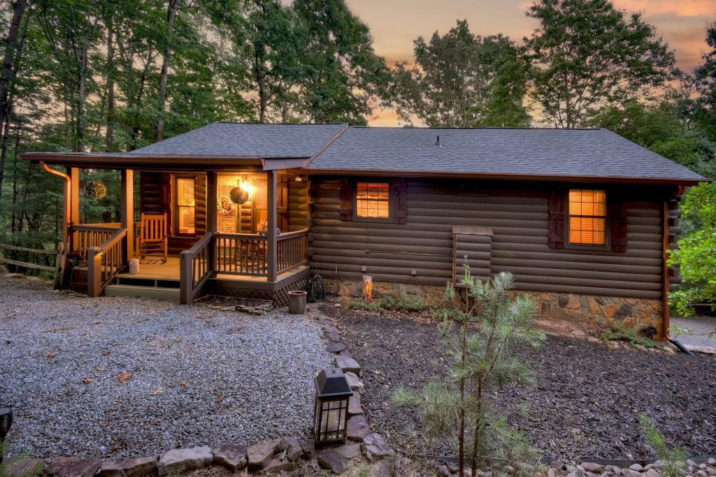 97 Doyle Carder Parkway Blue Ridge, GA 30513 - Photo 49 of 49 a view of a house with a yard and sitting area