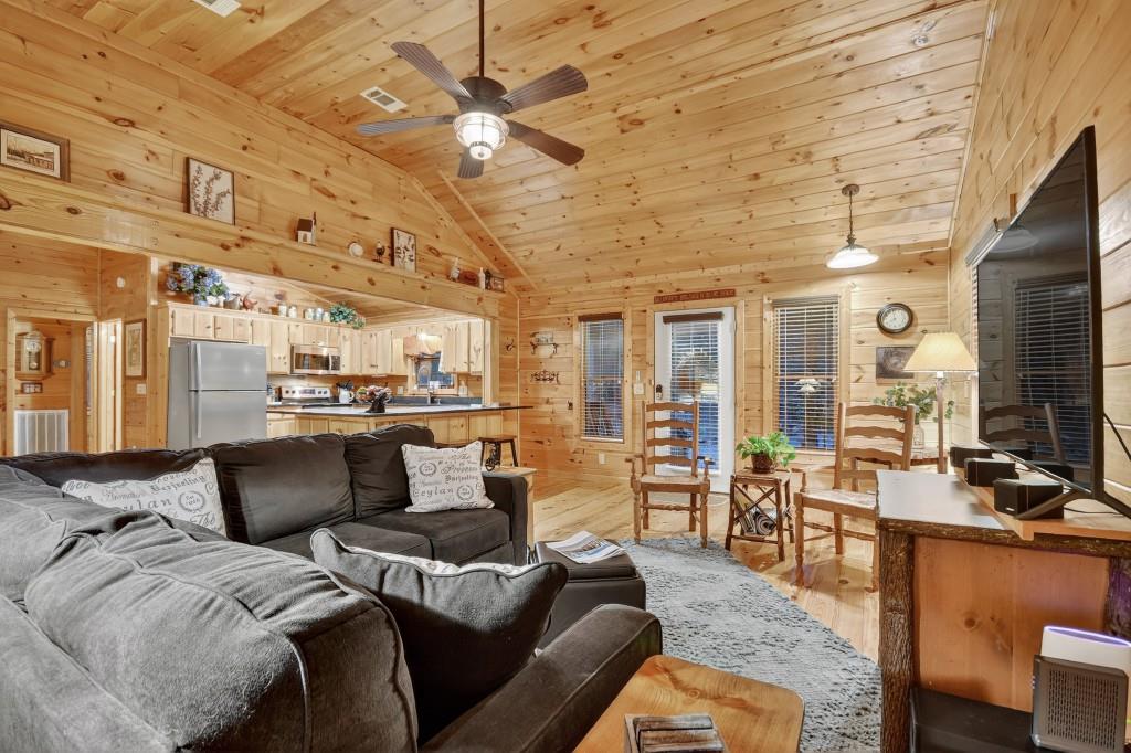 97 Doyle Carder Parkway Blue Ridge, GA 30513 - Photo 8 of 49 a living room with furniture and a flat screen tv