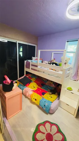 a room with furniture and flat screen tv