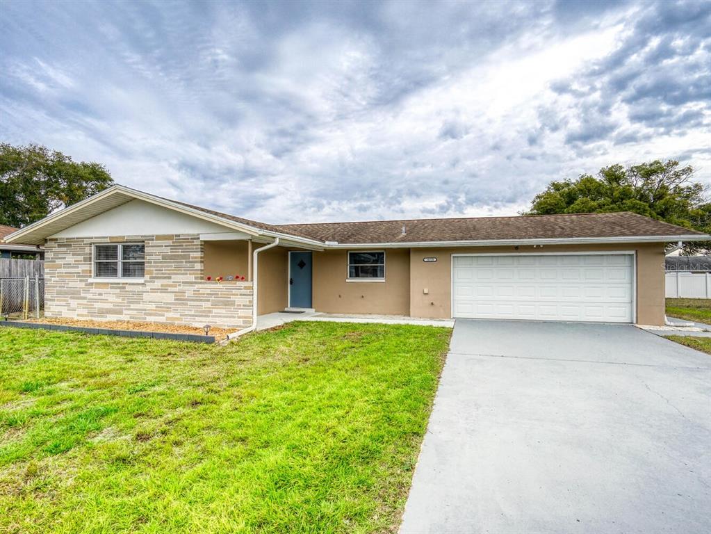 10320 Honeysuckle Lane Port Richey, FL 34668 - Photo 1 of 53 Gallery Image 1