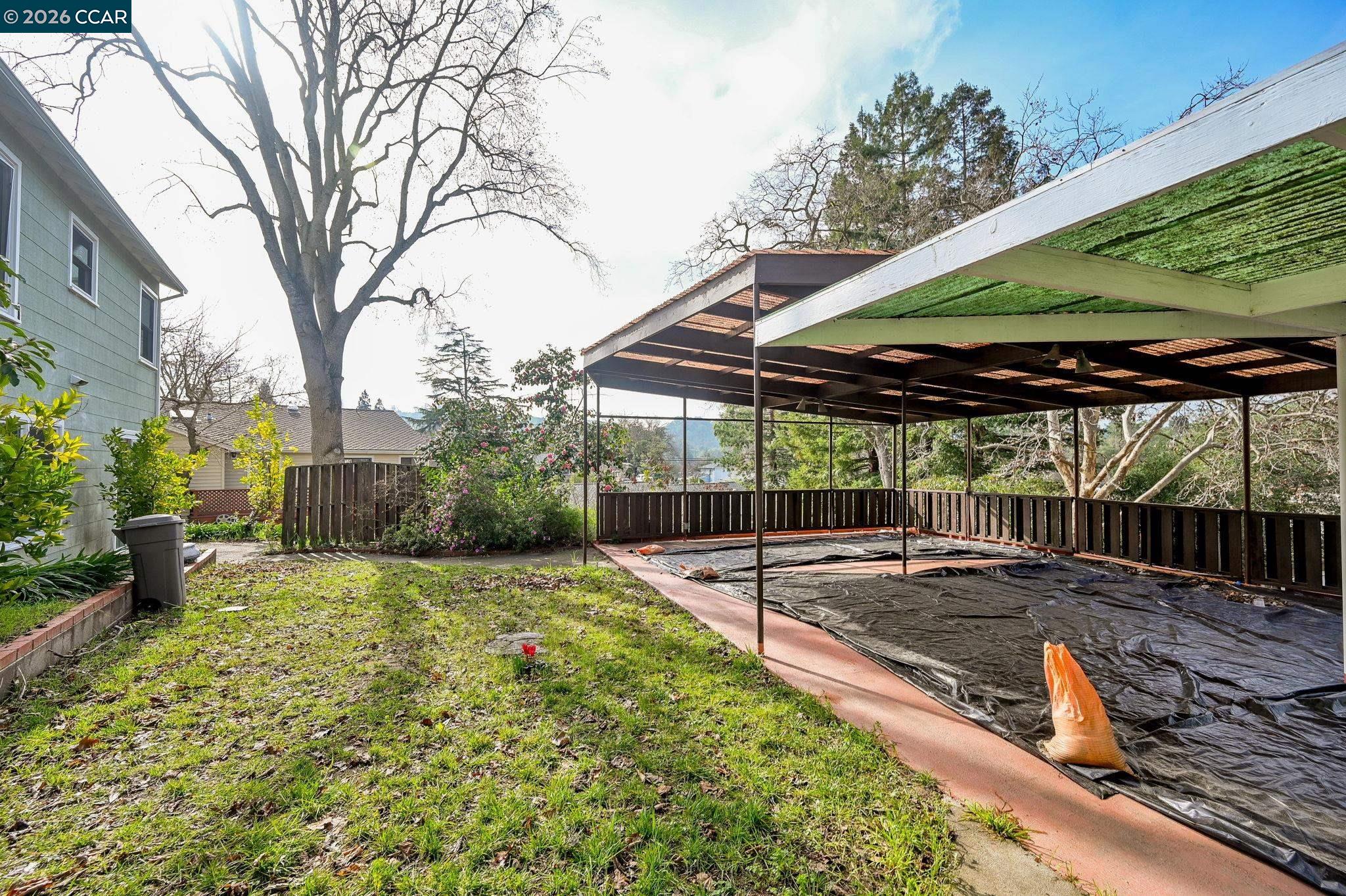 1521 Sunset Loop Lafayette, CA 94549 - Photo 13 of 19 a view of a backyard with a patio
