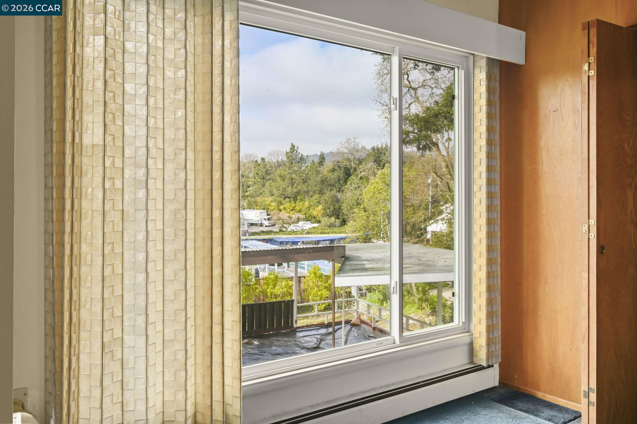1521 Sunset Loop Lafayette, CA 94549 - Photo 4 of 19 a view of a room that has a large window