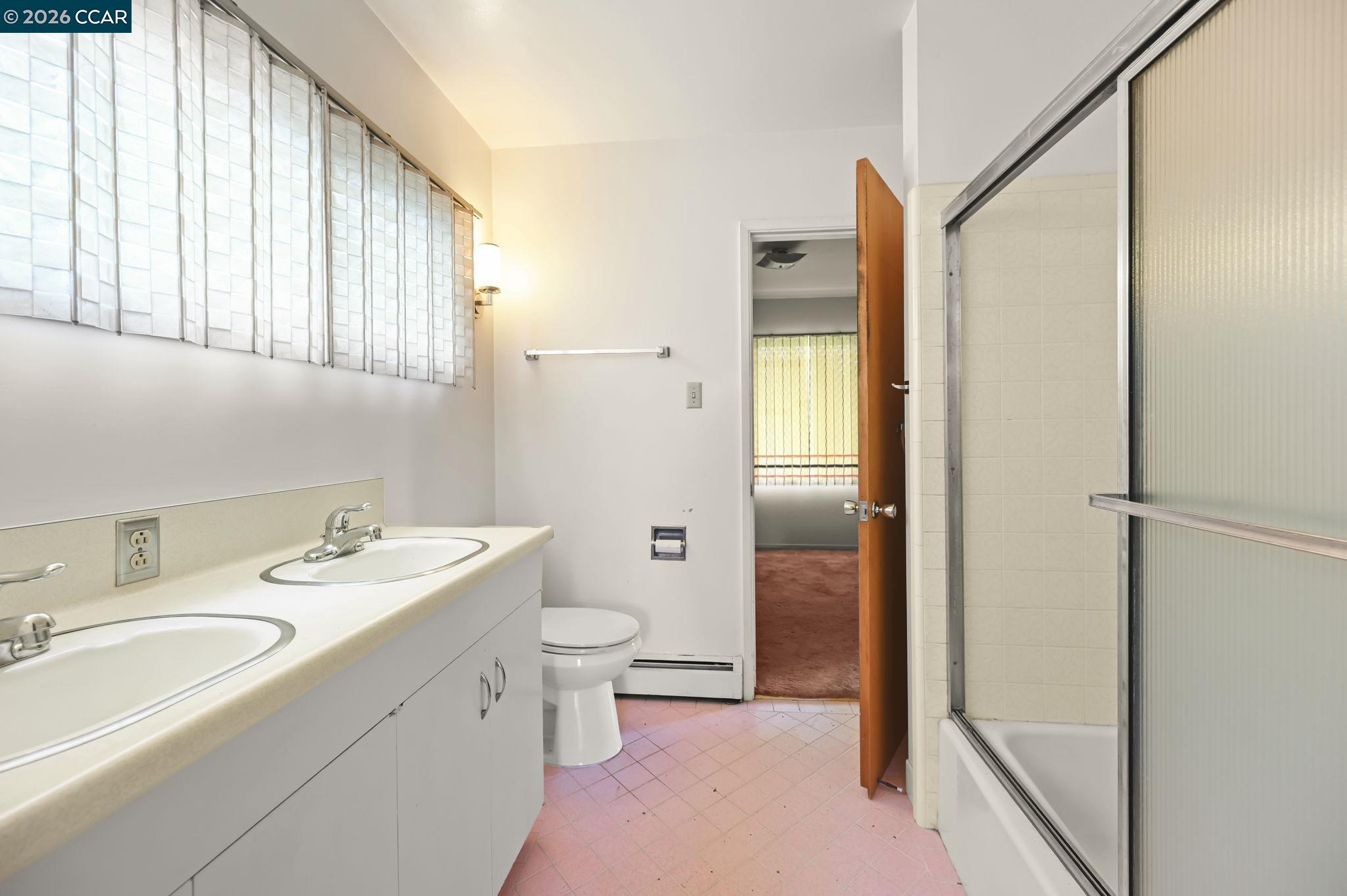 1521 Sunset Loop Lafayette, CA 94549 - Photo 7 of 19 a bathroom with a sink a toilet and shower