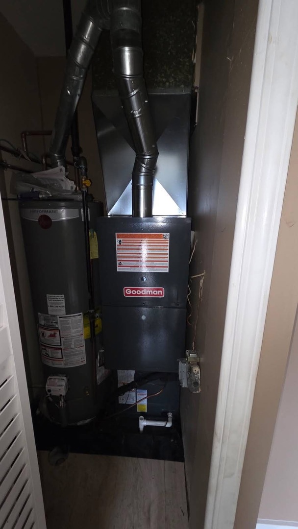 7722 West 81st Place Bridgeview, IL 60455 - Photo 13 of 13 a close view of water heater