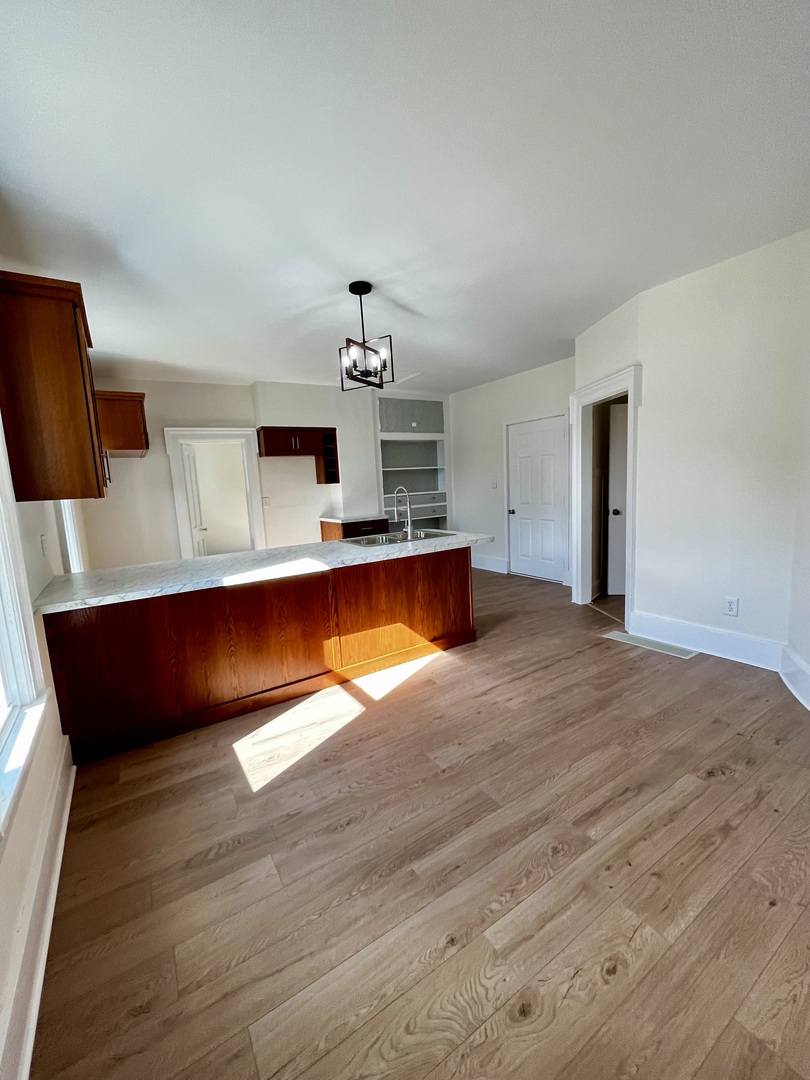 403 Uncas Street Tonica, IL 61370 - Photo 11 of 30 a view of kitchen with furniture and wooden floor