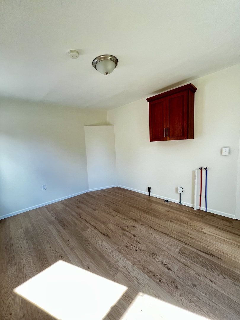 403 Uncas Street Tonica, IL 61370 - Photo 15 of 30 a bedroom with a bed and a cabinet