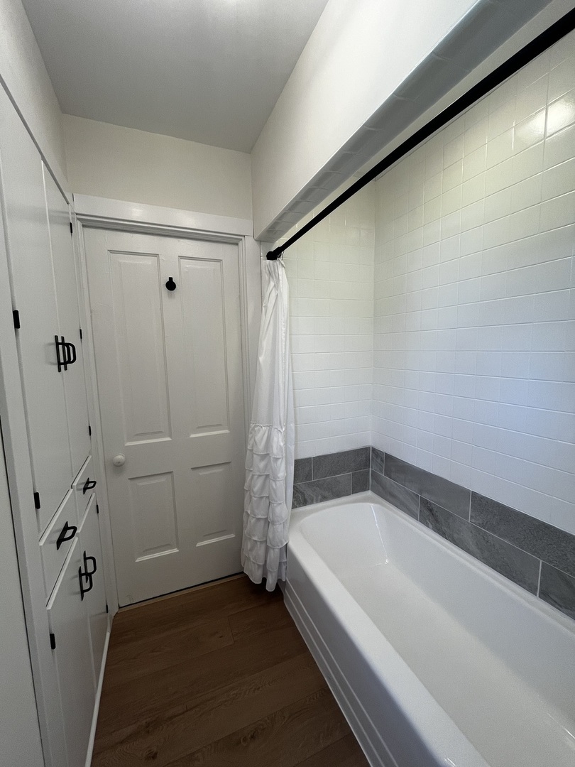 403 Uncas Street Tonica, IL 61370 - Photo 18 of 30 a bathroom with a bathtub and shower