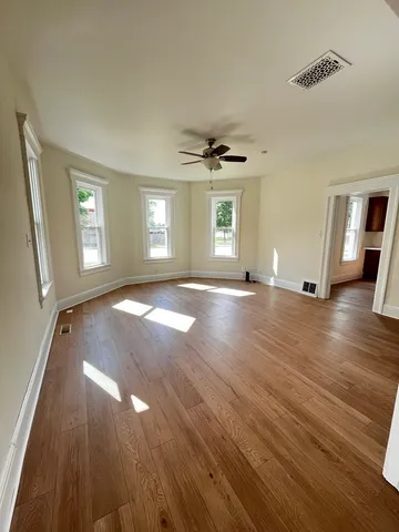 a view of livingroom with hardwood floor and window