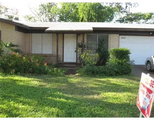 a view of a back yard of the house