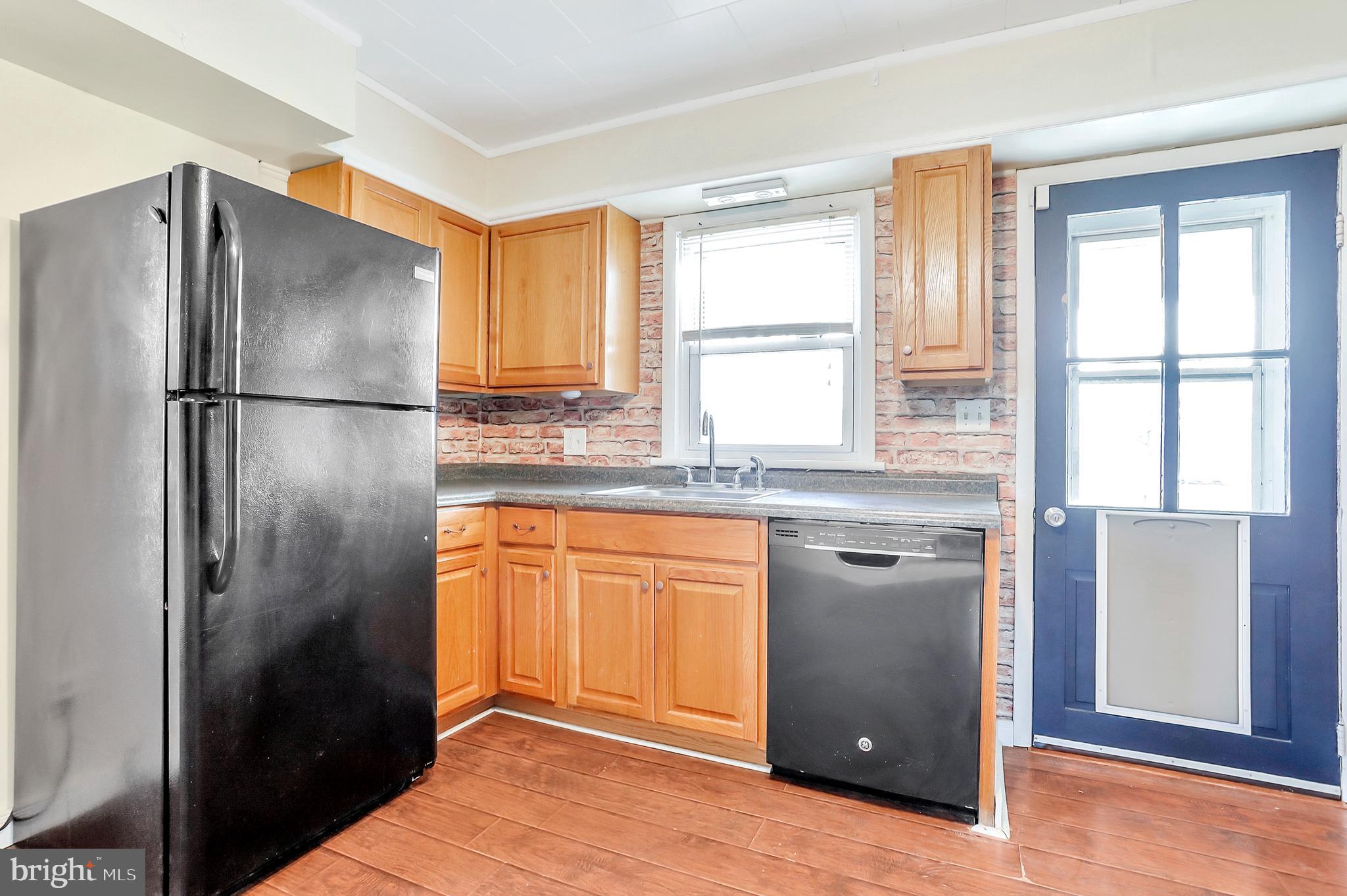 13837 Big Pool Road Clear Spring, MD 21722 - Photo 12 of 57 a kitchen with stainless steel appliances granite countertop a refrigerator and a sink