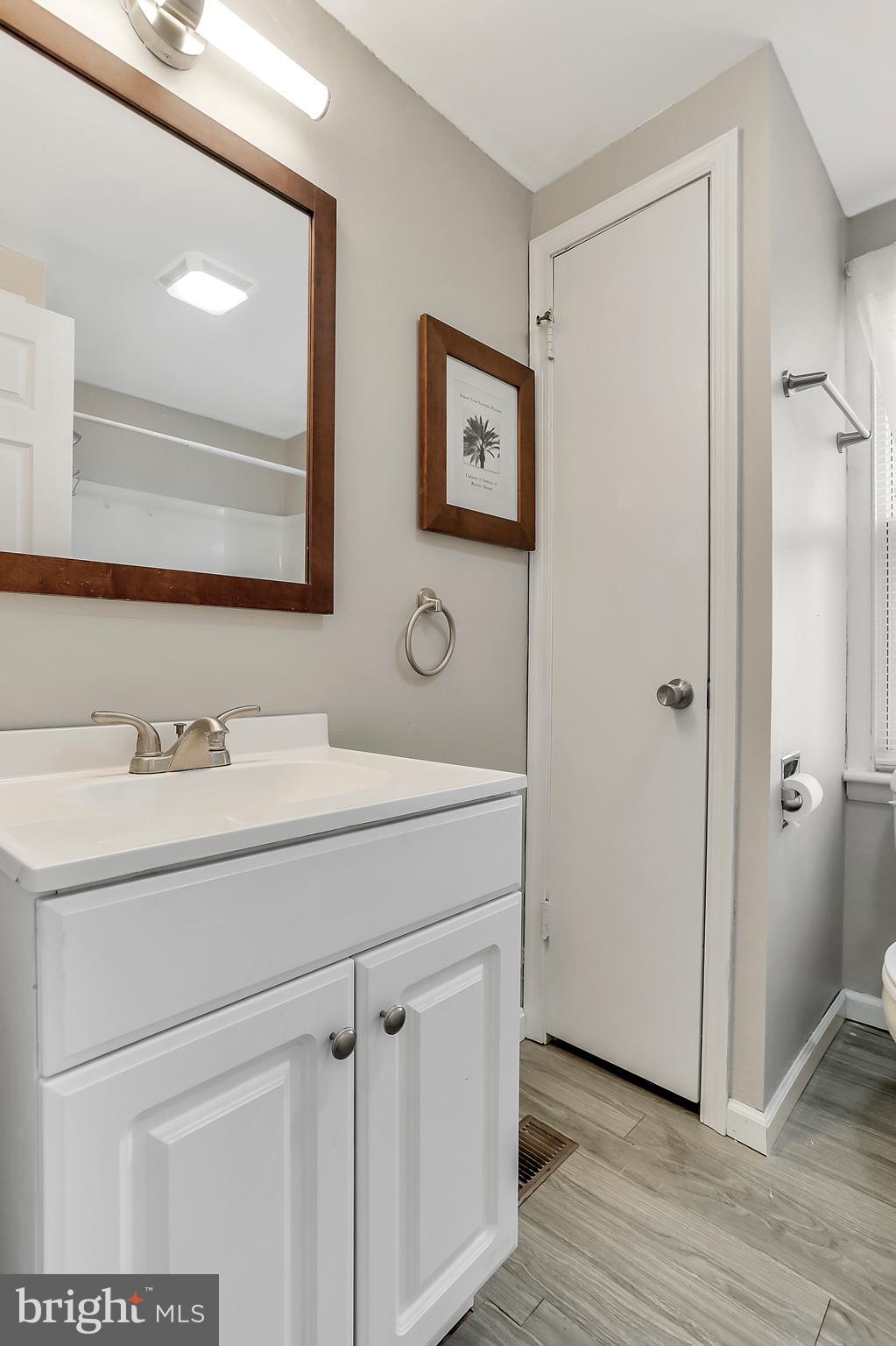 13837 Big Pool Road Clear Spring, MD 21722 - Photo 17 of 57 a bathroom with a sink and a mirror