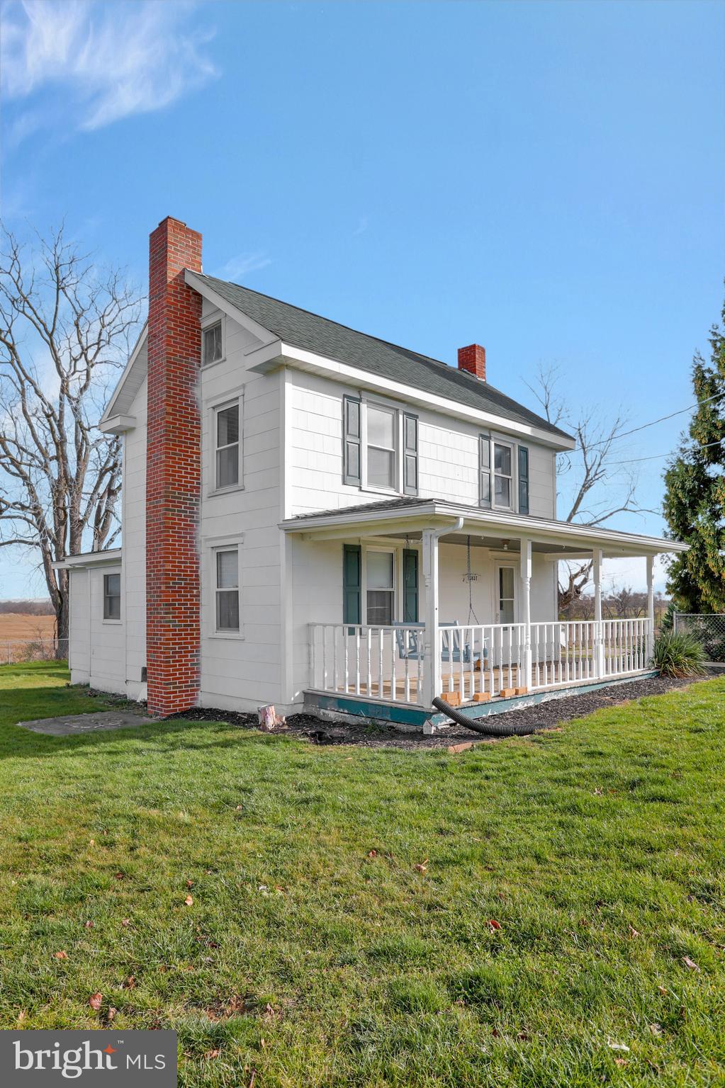 13837 Big Pool Road Clear Spring, MD 21722 - Photo 5 of 57 a front view of a house with a yard
