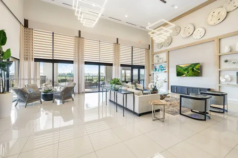 a view of swimming pool with outdoor seating