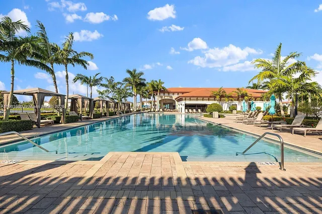 a view of a patio with a table chairs and a patio