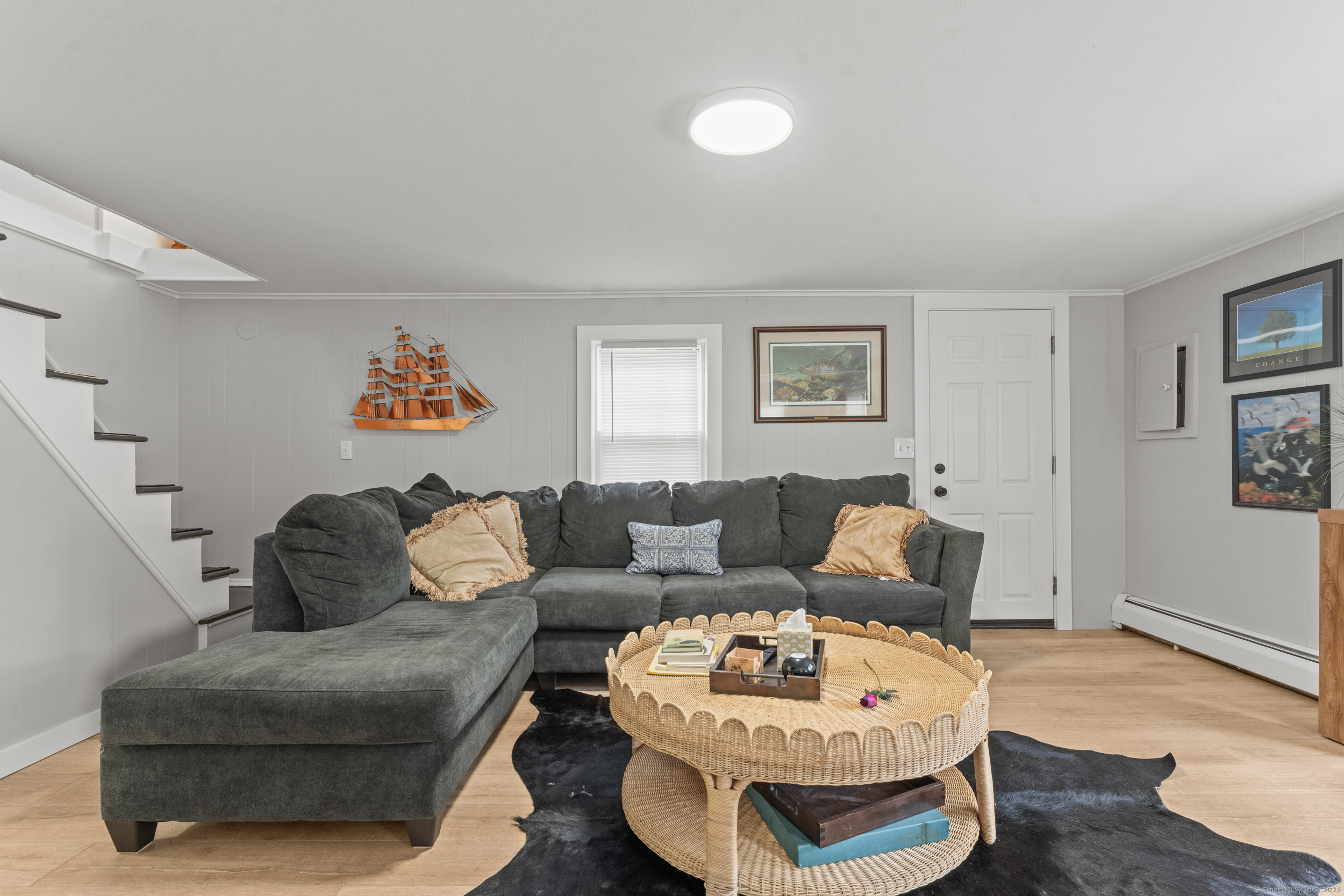 15 Hawthorne Road East Hampton, CT 06424 - Photo 7 of 19 a living room with furniture and a wooden floor