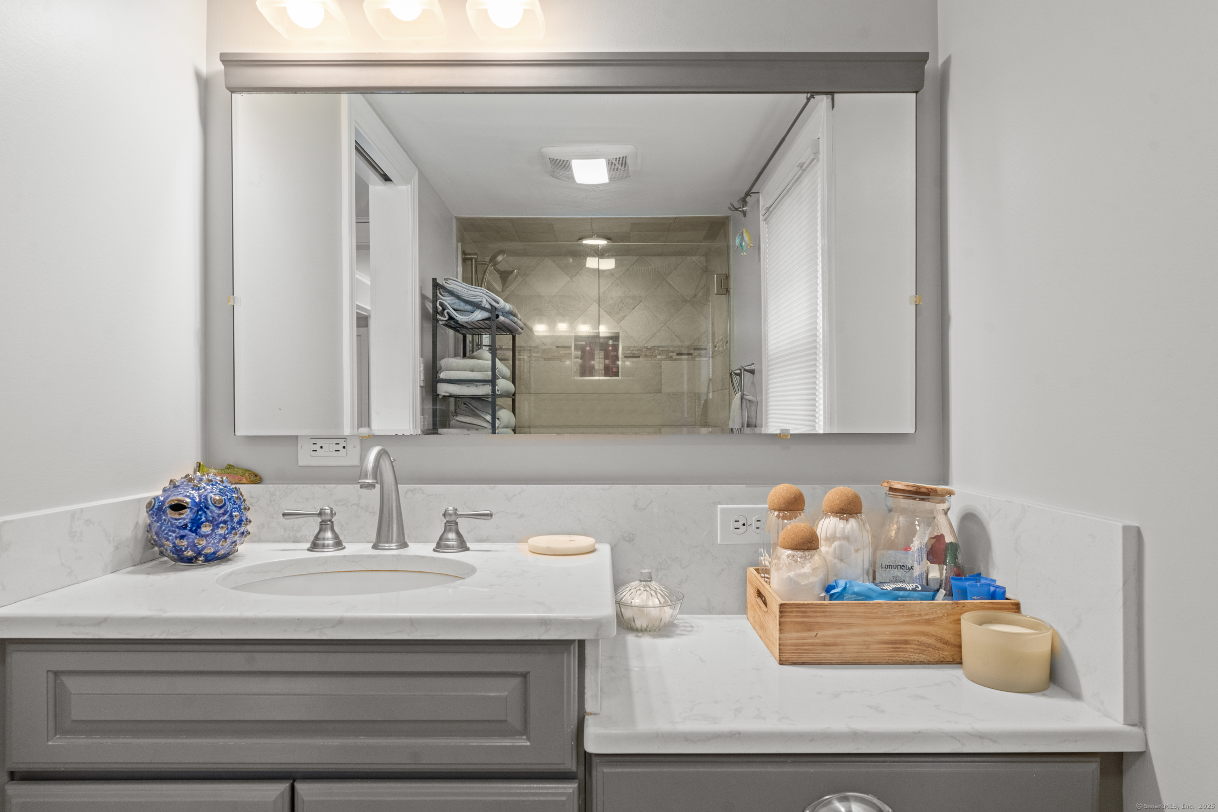 15 Hawthorne Road East Hampton, CT 06424 - Photo 10 of 19 a bathroom with a sink and a mirror