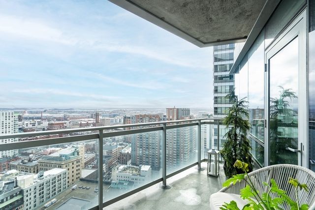 a view of a balcony with city view