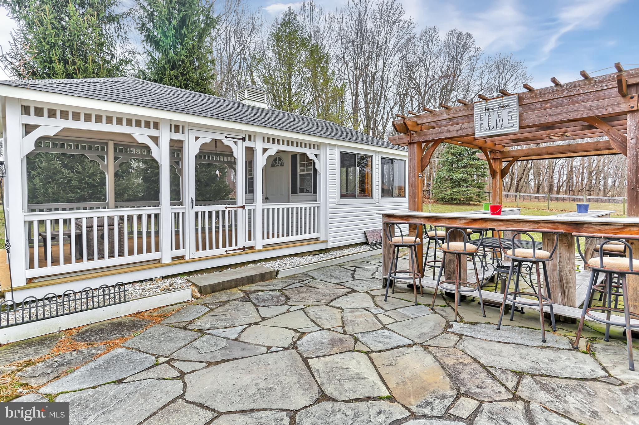 114 Abbey Road New Freedom, PA 17349 - Photo 37 of 46 Screened-In Gazebo with Hot Tub Room