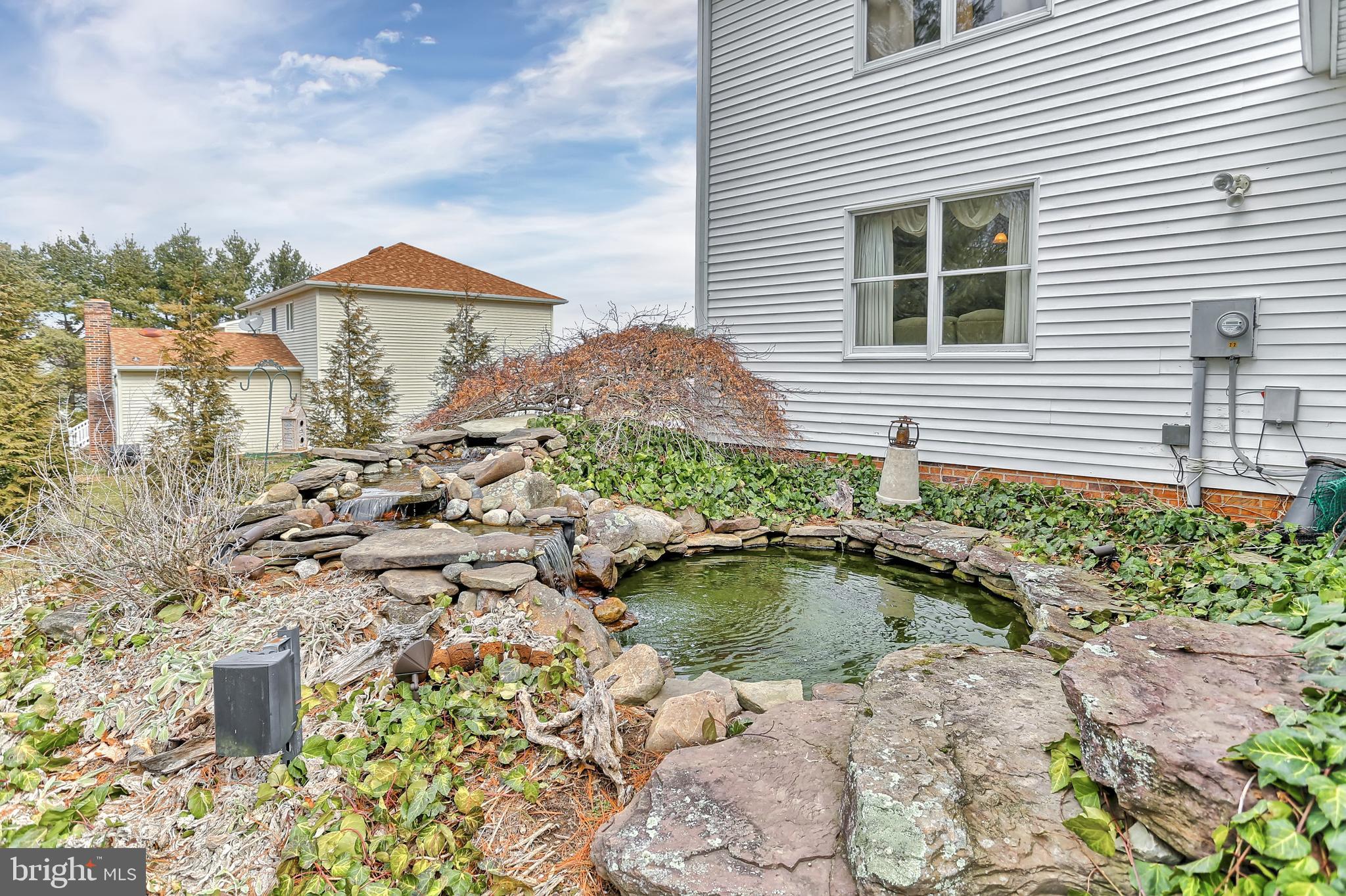 114 Abbey Road New Freedom, PA 17349 - Photo 39 of 46 Double Waterfall Fish Pond