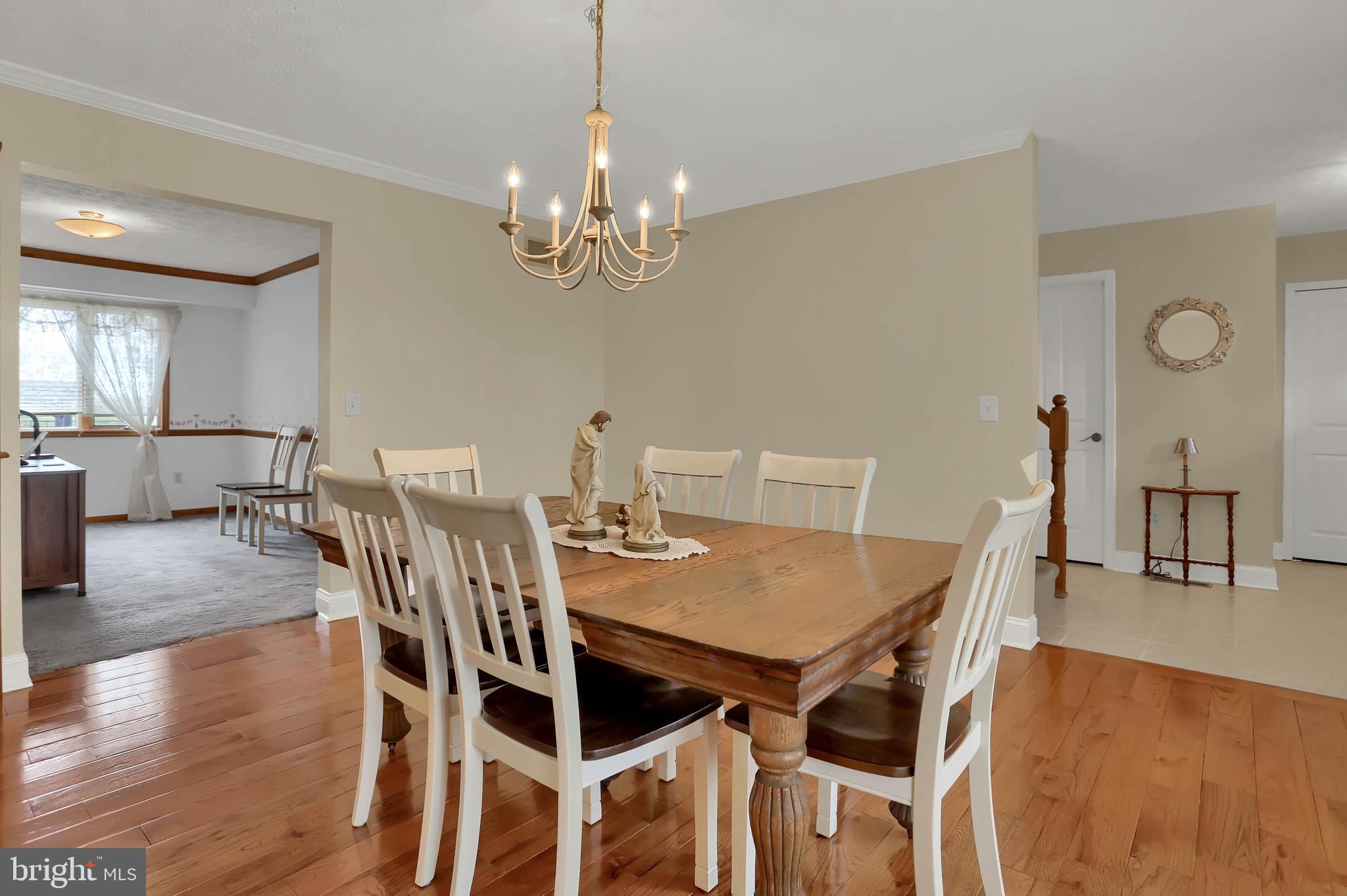 Large Formal Dining Room with Wood Floors