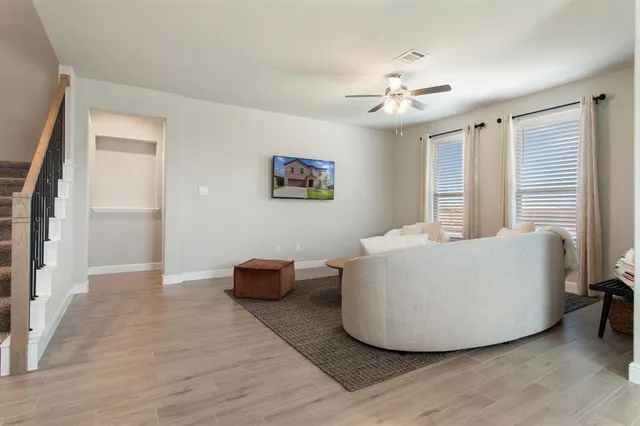 a white tub sitting next to a window