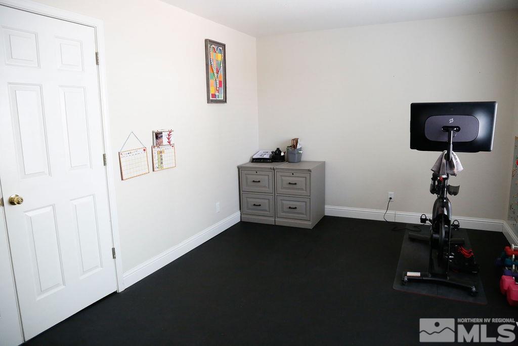 9841 Eastmont Court Reno, NV 89521 - Photo 31 of 38 a view of workspace with hardwood floor