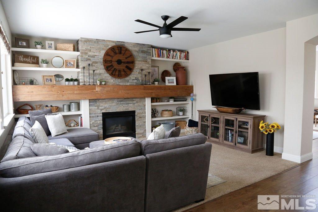9841 Eastmont Court Reno, NV 89521 - Photo 8 of 38 a living room with furniture and a flat screen tv