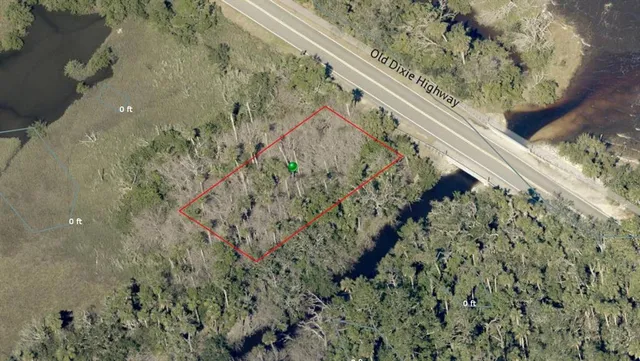 a view of a garden with a pathway