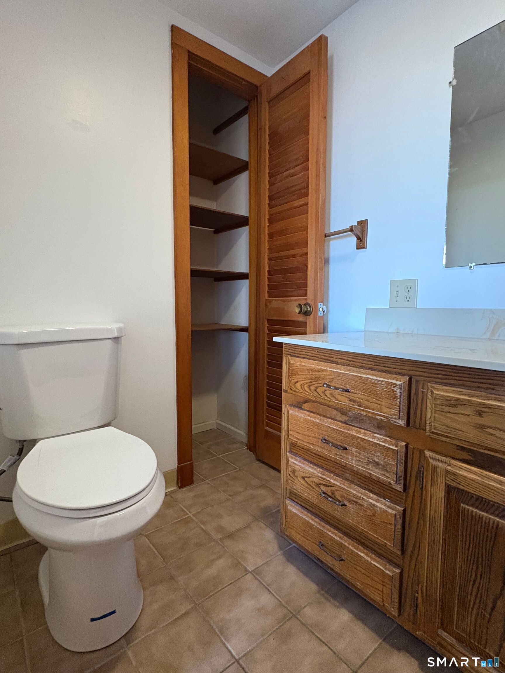 278 Chamberlain Road, Unit IN Middletown, CT 06457 - Photo 2 of 7 a bathroom with a toilet and a sink