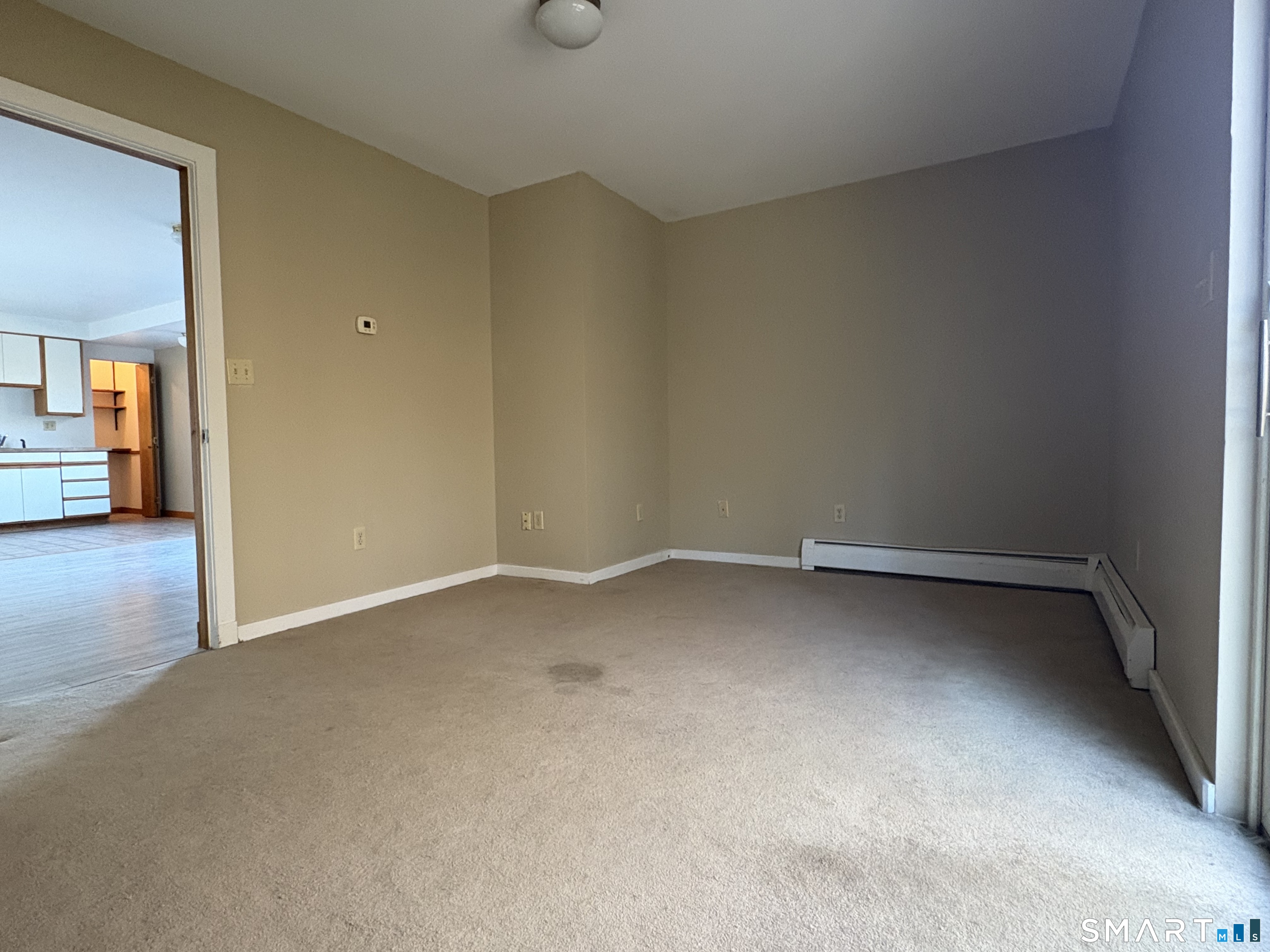 278 Chamberlain Road, Unit IN Middletown, CT 06457 - Photo 3 of 7 a view of an empty room and a window