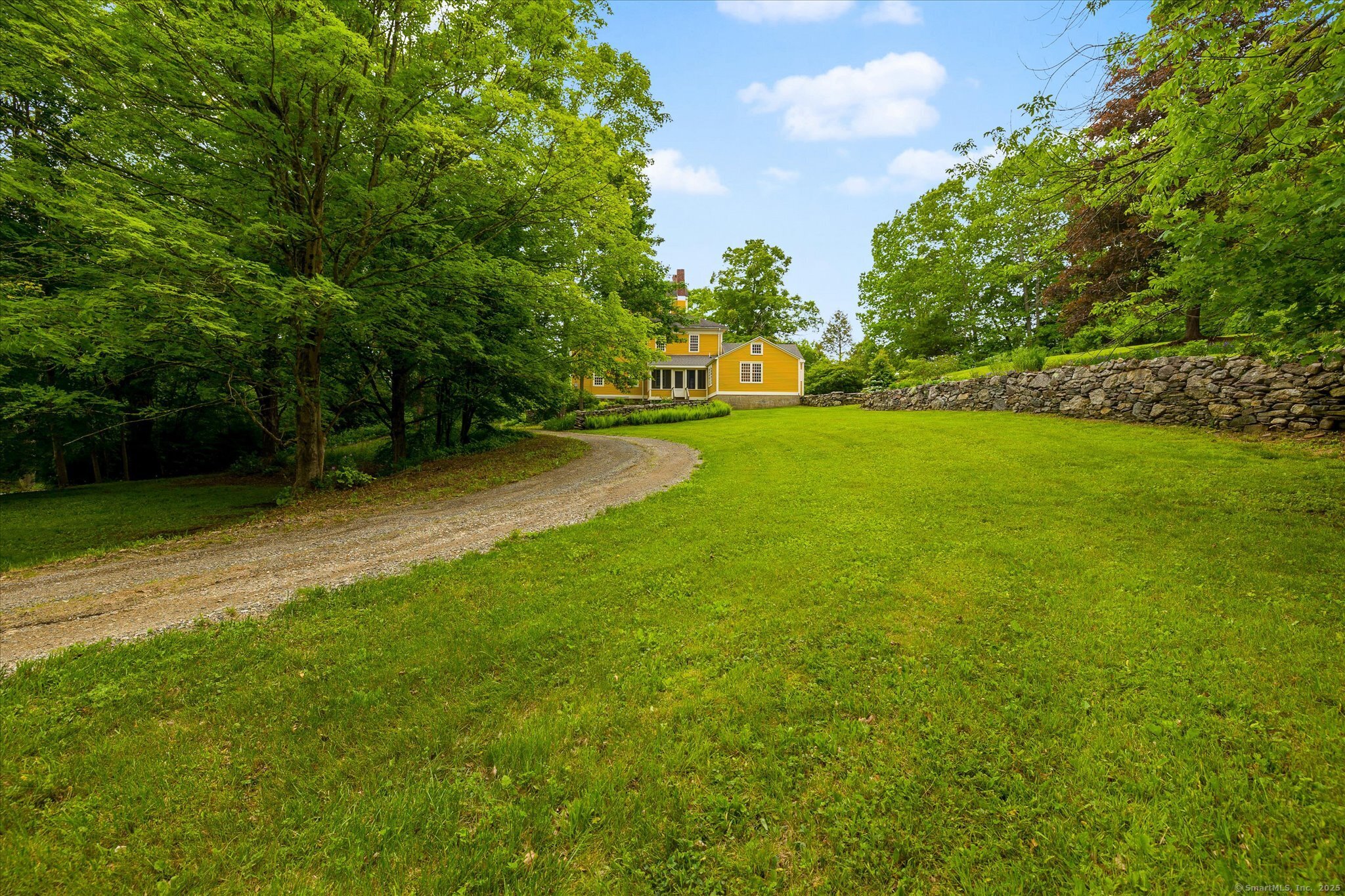 89 John Perry Road Eastford, CT 06242 - Photo 1 of 40 a view of a field of grass and trees