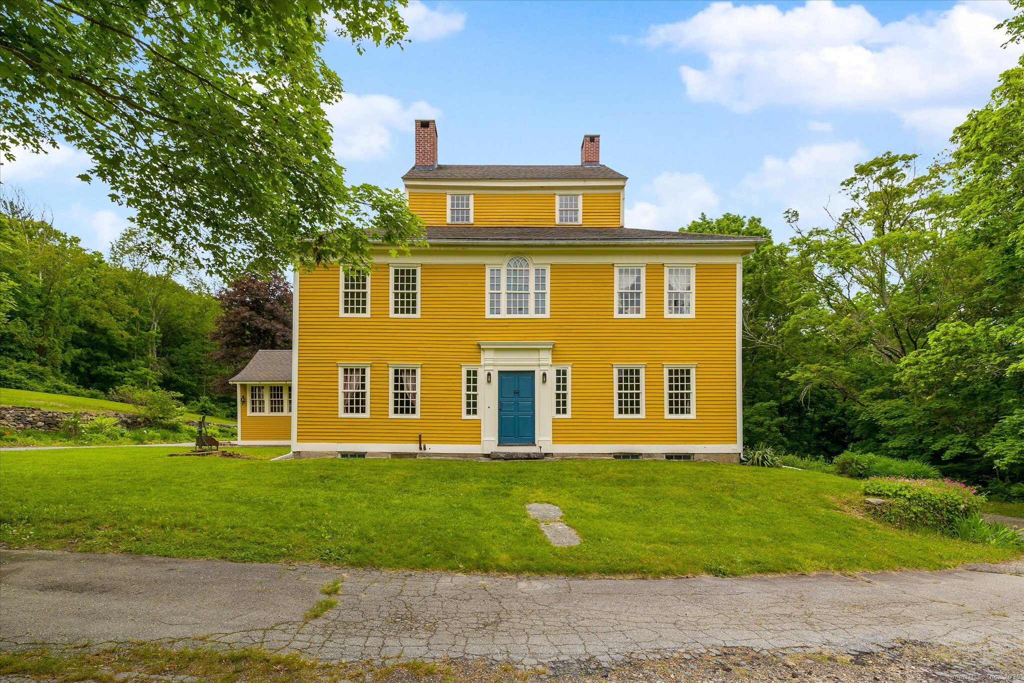 89 John Perry Road Eastford, CT 06242 - Photo 14 of 40 a front view of a house with a garden