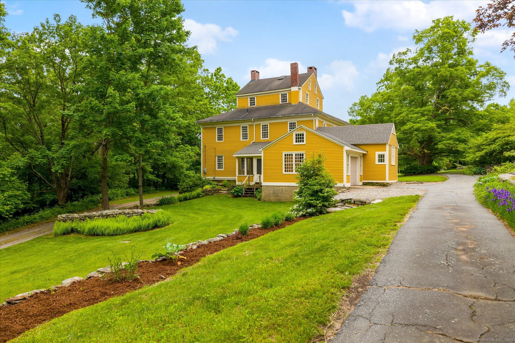 89 John Perry Road Eastford, CT 06242 - Photo 15 of 40 a front view of a house with a yard