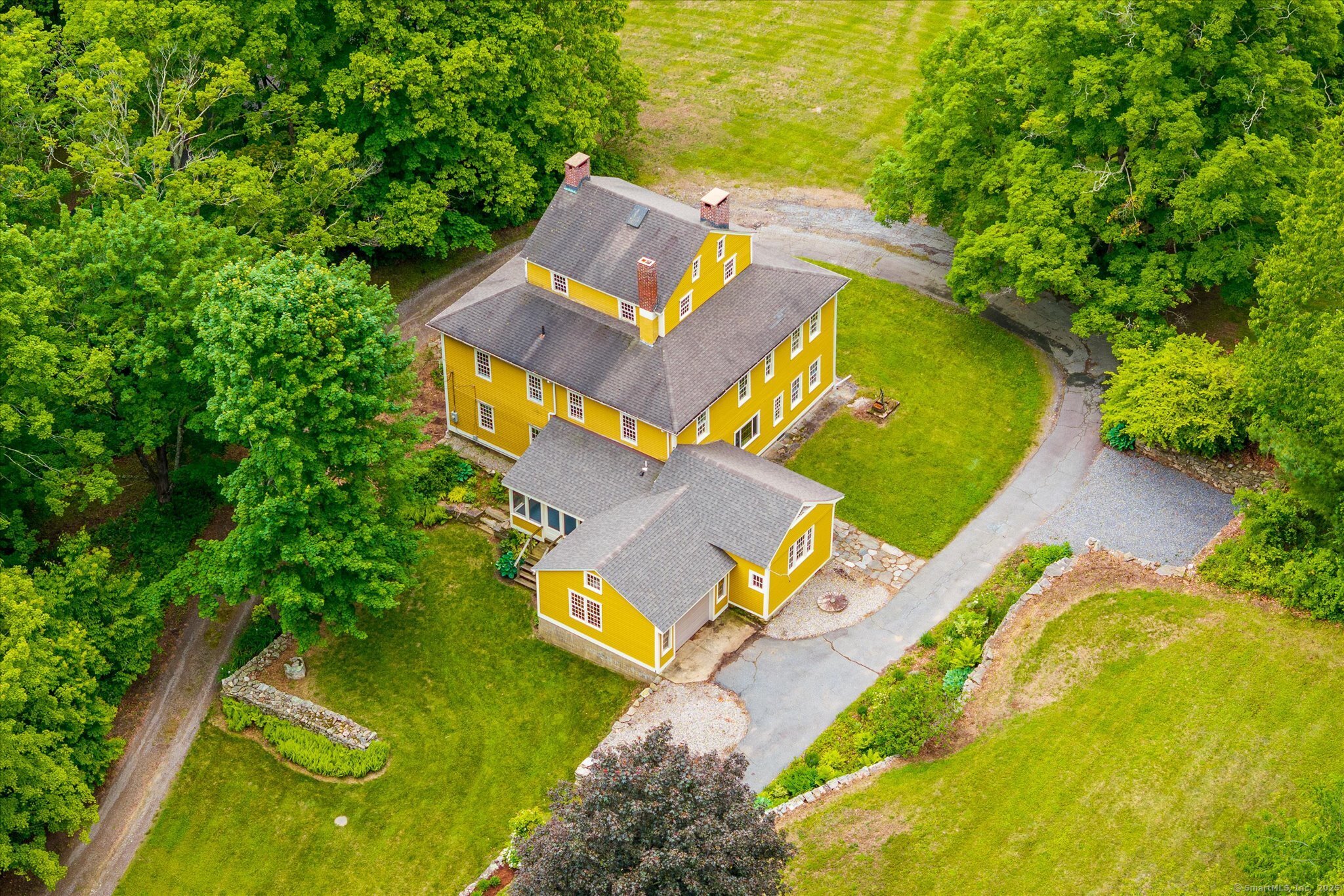 89 John Perry Road Eastford, CT 06242 - Photo 19 of 40 an aerial view of a house with swimming pool and garden space