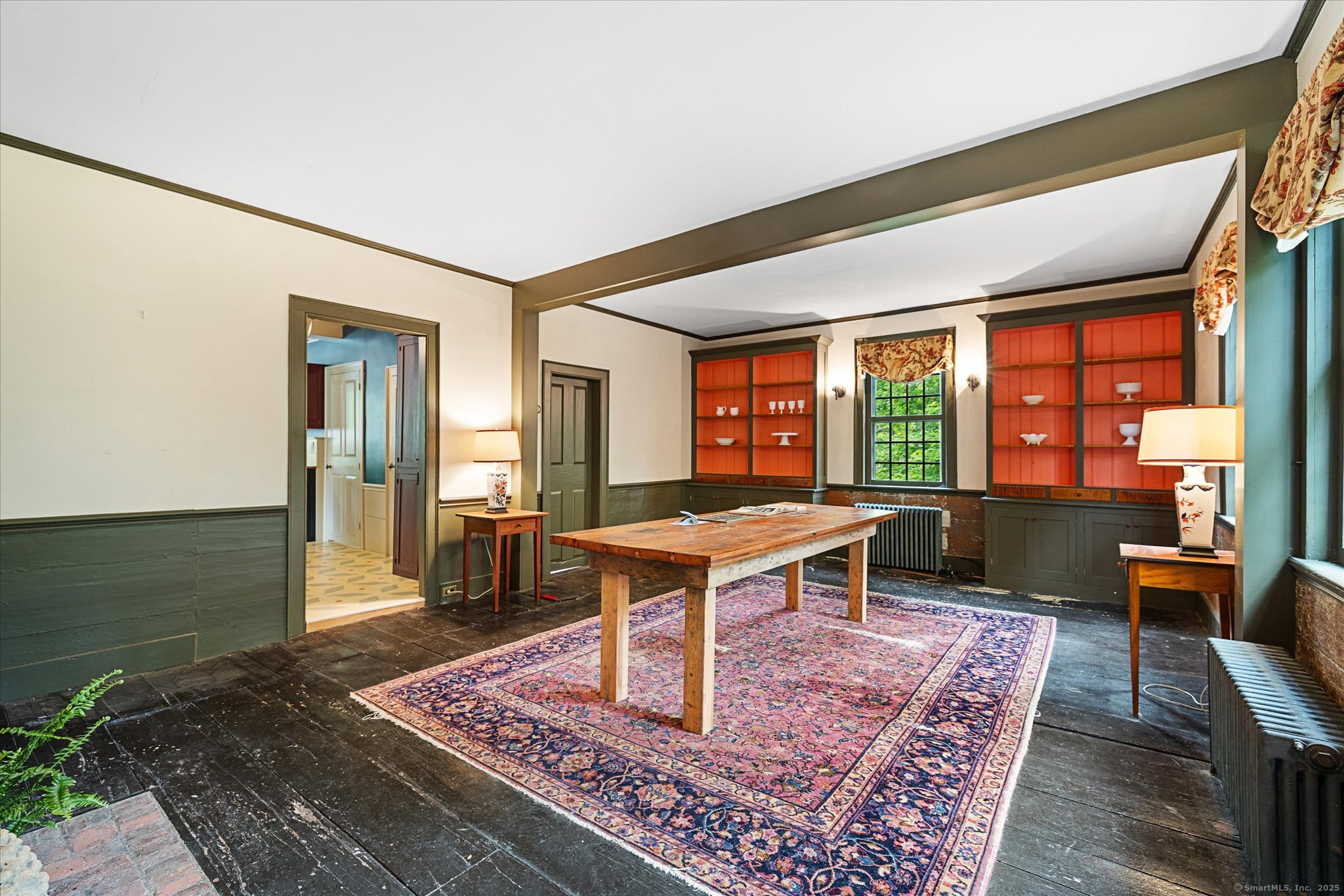 89 John Perry Road Eastford, CT 06242 - Photo 22 of 40 a living room with furniture a rug wooden floor and a large window