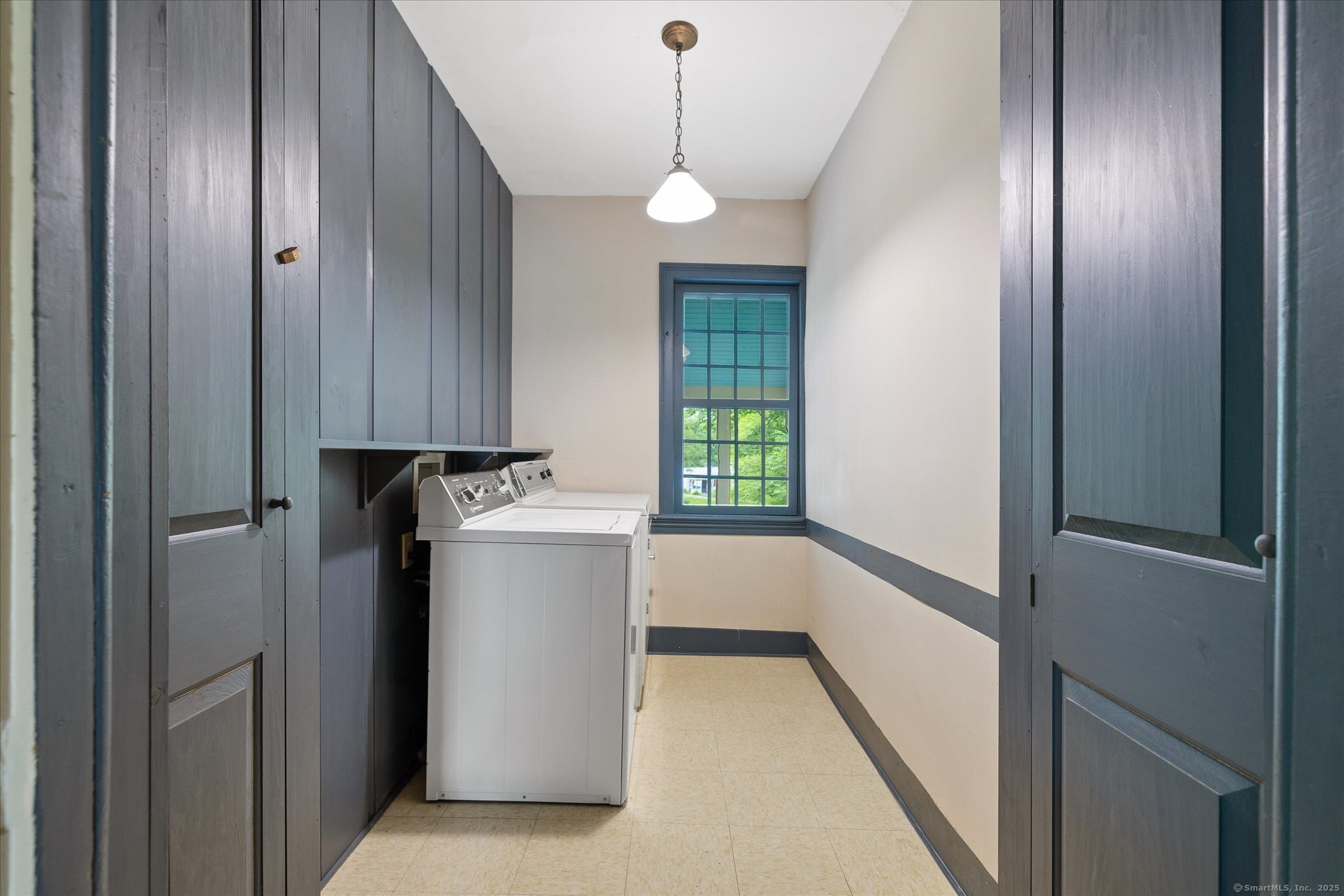 89 John Perry Road Eastford, CT 06242 - Photo 27 of 40 a room with refrigerator and window