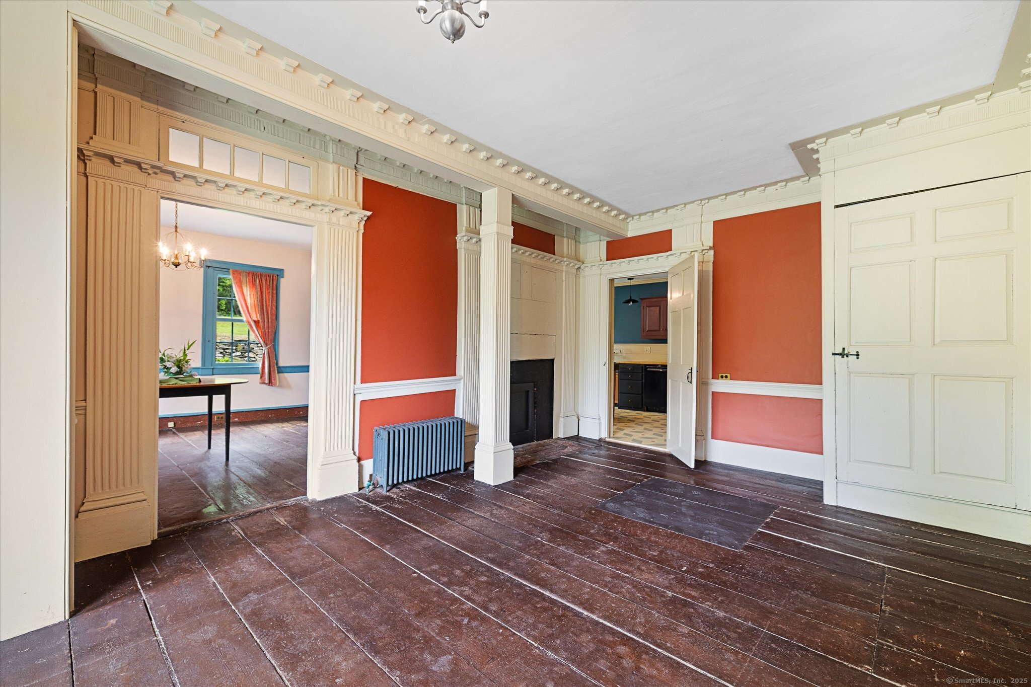 89 John Perry Road Eastford, CT 06242 - Photo 3 of 40 a view of an empty room with a fireplace