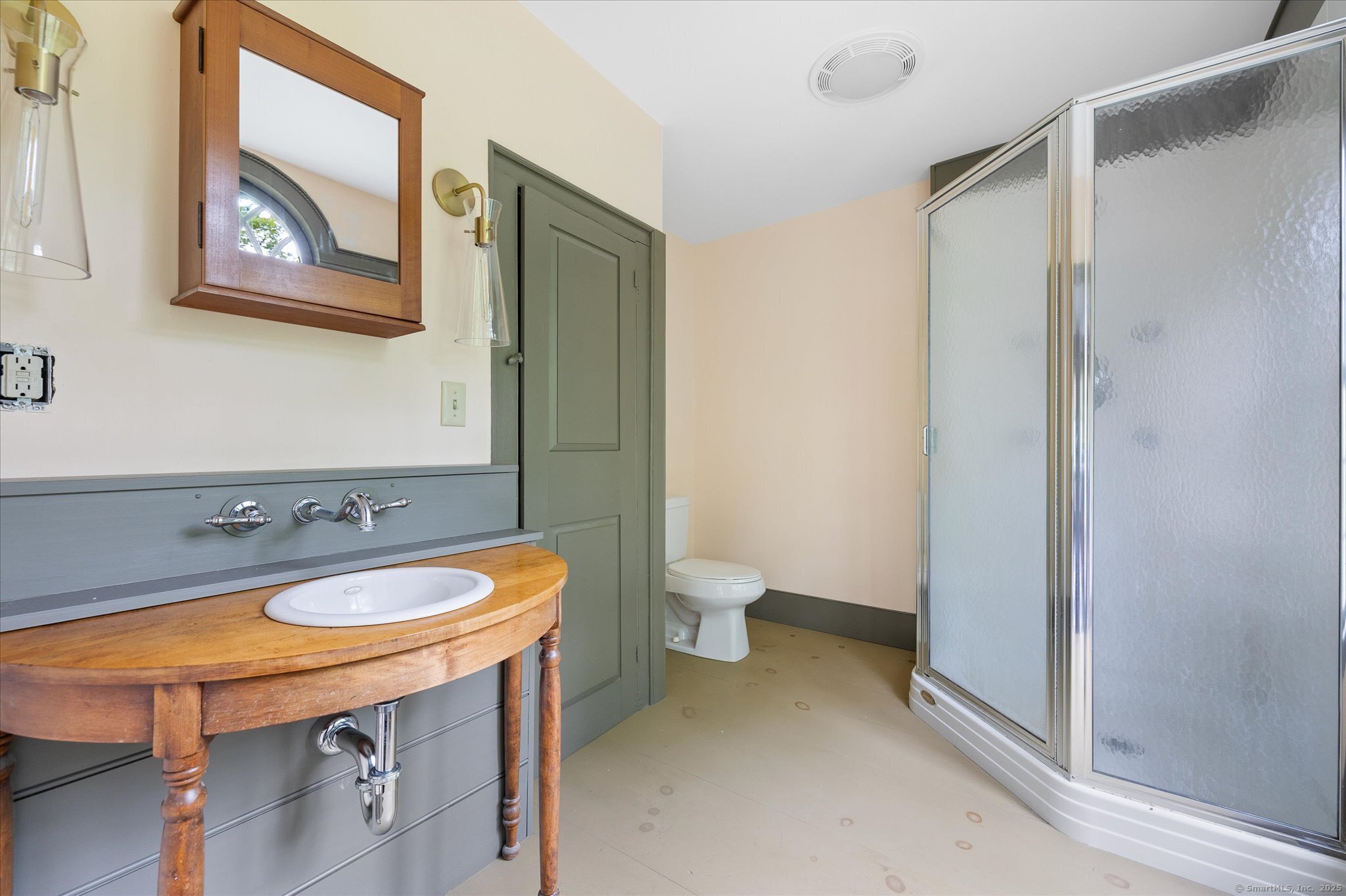 89 John Perry Road Eastford, CT 06242 - Photo 35 of 40 a bathroom with a sink a toilet and shower